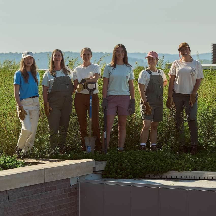 Tradeswomen wearing Carhartt workwear representing women in the trades.