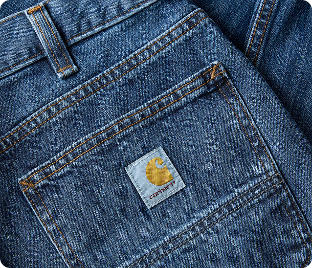 Close-up view of Carhartt denim jeans highlighting the material's texture