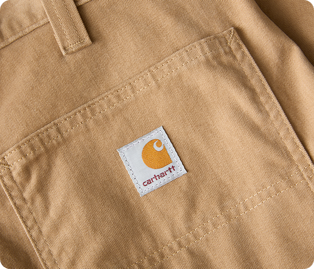 Close-up view of Carhartt twill pant material highlighting the weave and texture