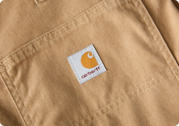 Close-up view of Carhartt twill pant material highlighting the weave and texture