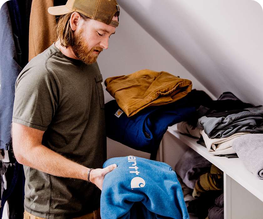 Nick Leonard from Statewoods Co. collecting his used gear at home to trade in to Carhartt Reworked.